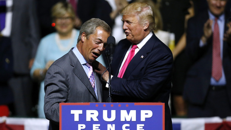 Donald Trump and Nigel Farage on stage at the podium in 2016