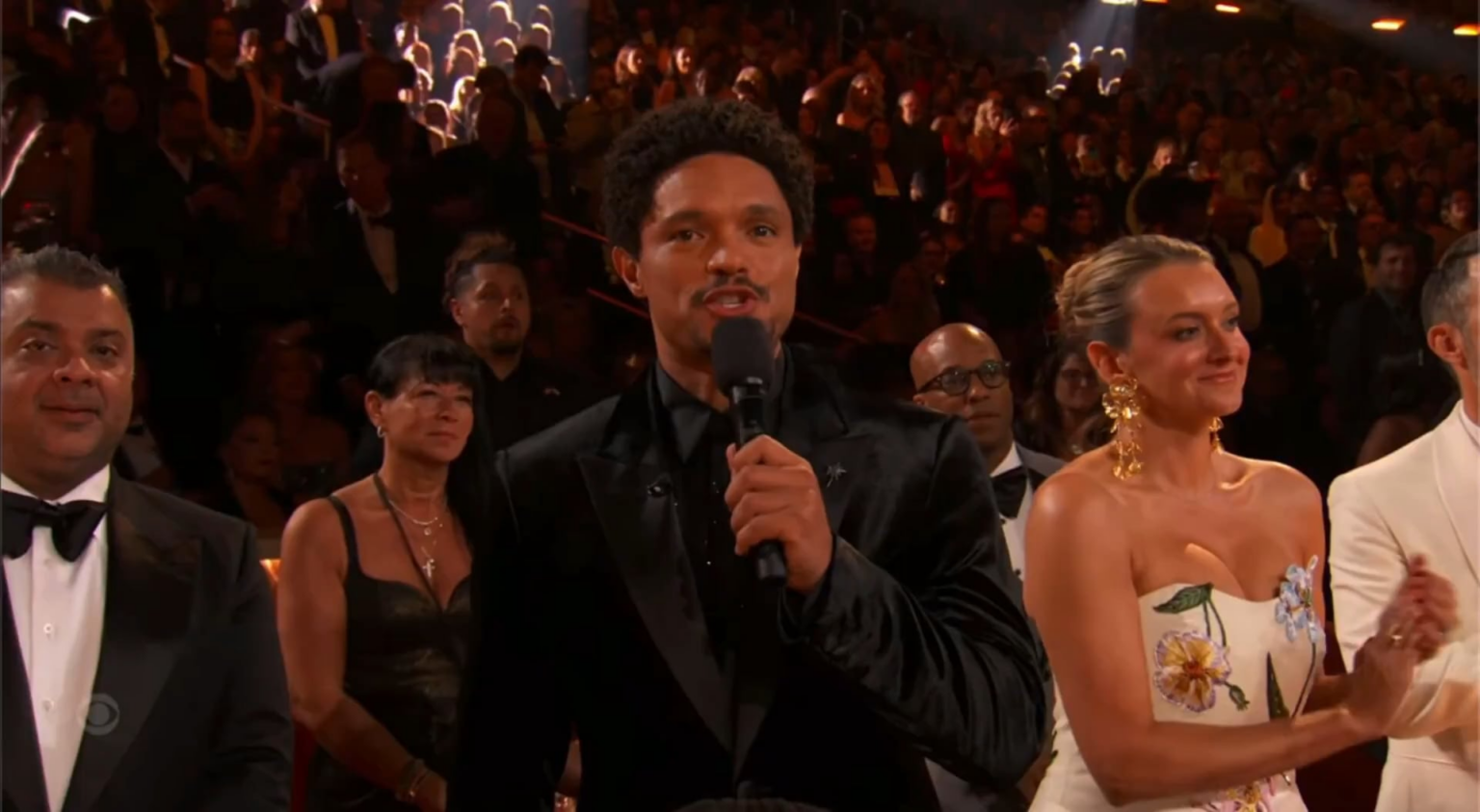 Trevor Noah: “Song of the Year, congratulations Billie Eilish, wow! That is a Grammy that every artist wants, almost as much as Trump wants Greenland. Which makes sense because Epstein’s island is gone, he needs a new one to hang out with Bill Clinton.”