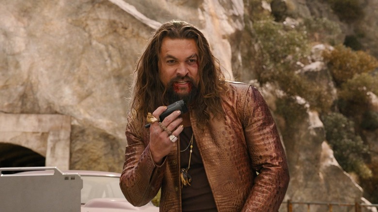 Jason Momoa as Dante Reyes talking on a walkie talkie in Fast X