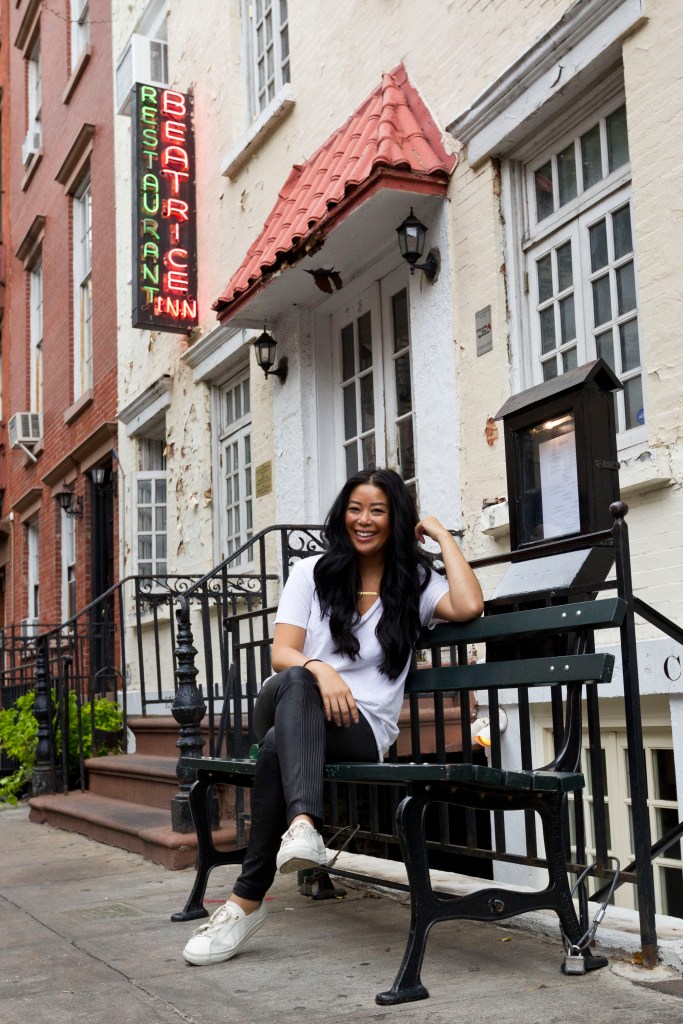 Angie Mar, head chef and owner of The Beatrice Inn, seated outside her restaurant.