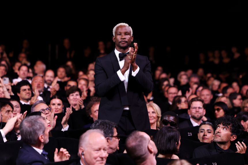 Akinola Davies Jr. during the closing ceremony at the Cannes Film Festival 2025. His film 