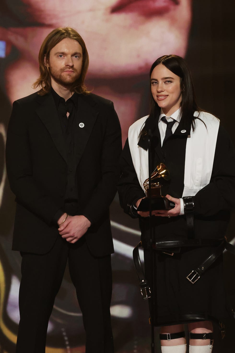 los angeles, california february 01: (l r) finneas oconnell and billie eilish accept the song of the year award for wildflower onstage during the 68th grammy awards at crypto.com arena on february 01, 2026 in los angeles, california. (photo by kevin winter/getty images for the recording academy)
