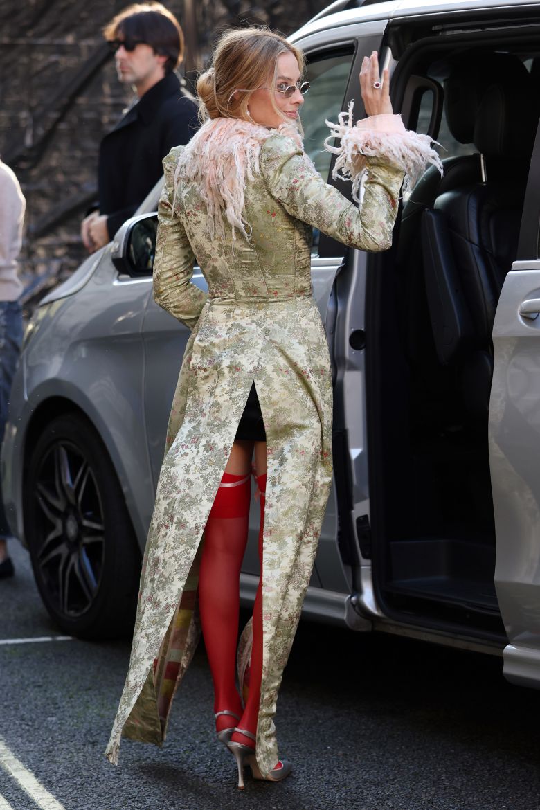 Earlier this week, Robbie wore an archival John Galliano jacket from Spring-Summer 1992.