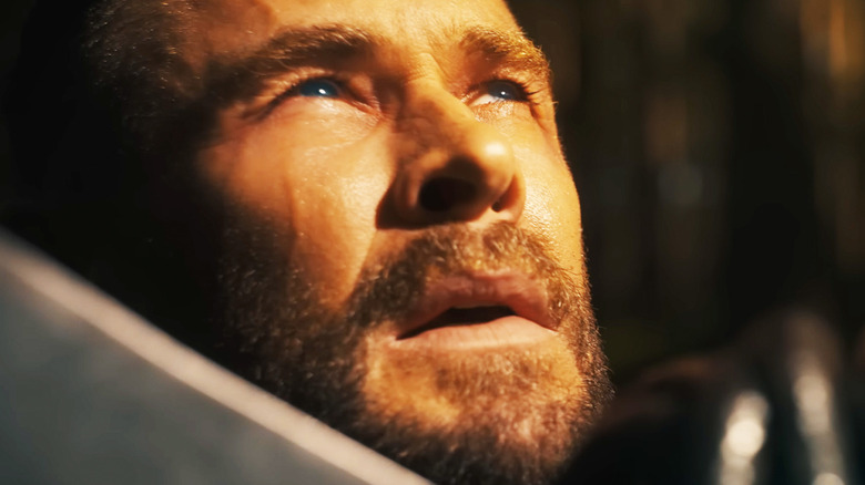 Chris Hemsworth's Thor looks up in closeup in a teaser trailer for Avengers Doomsday