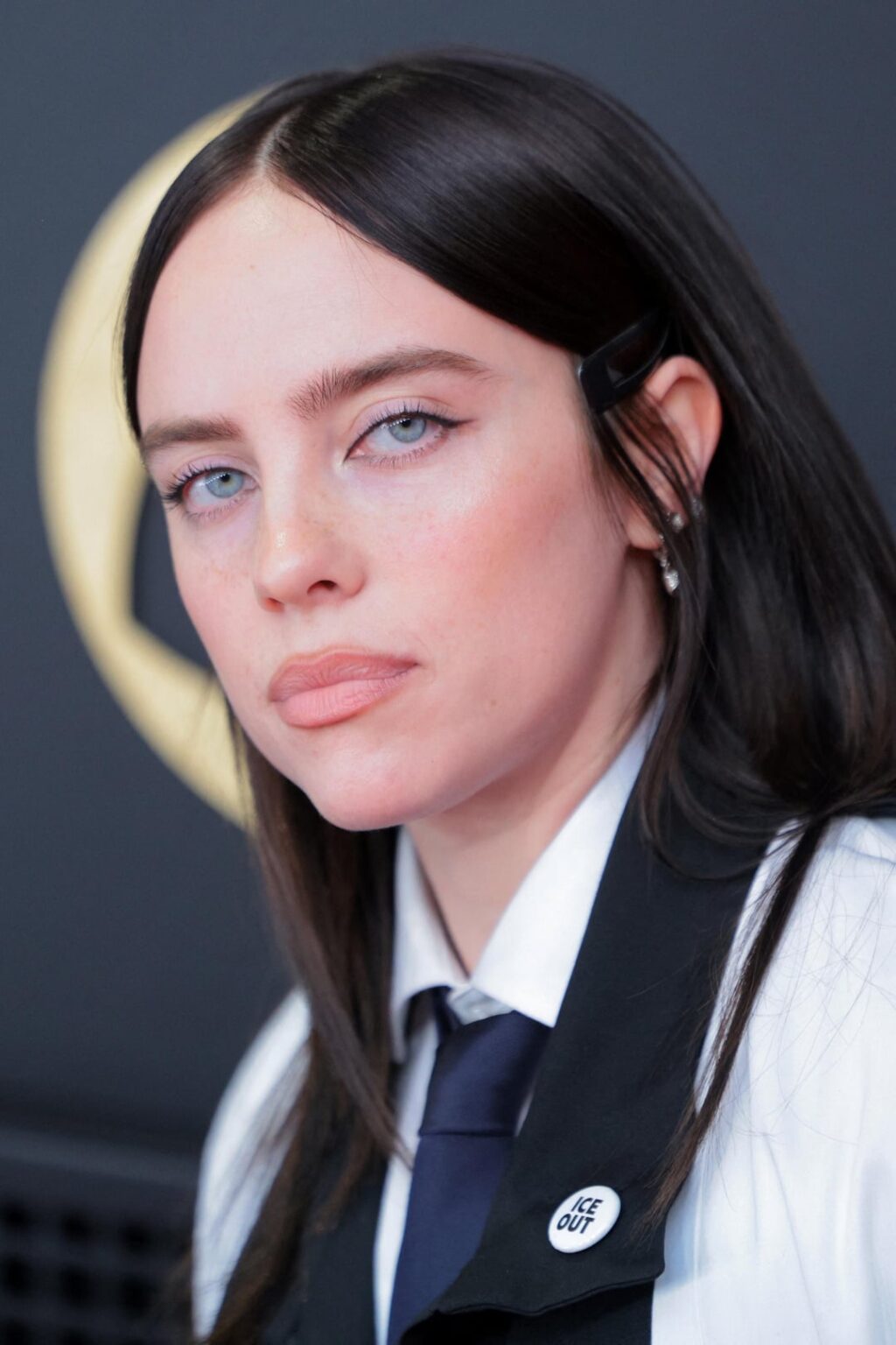 Billie Eilish wears an ‘ICE OUT’ pin at the 68th GRAMMY Awards in Los Angeles, California. (February 1, 2026)