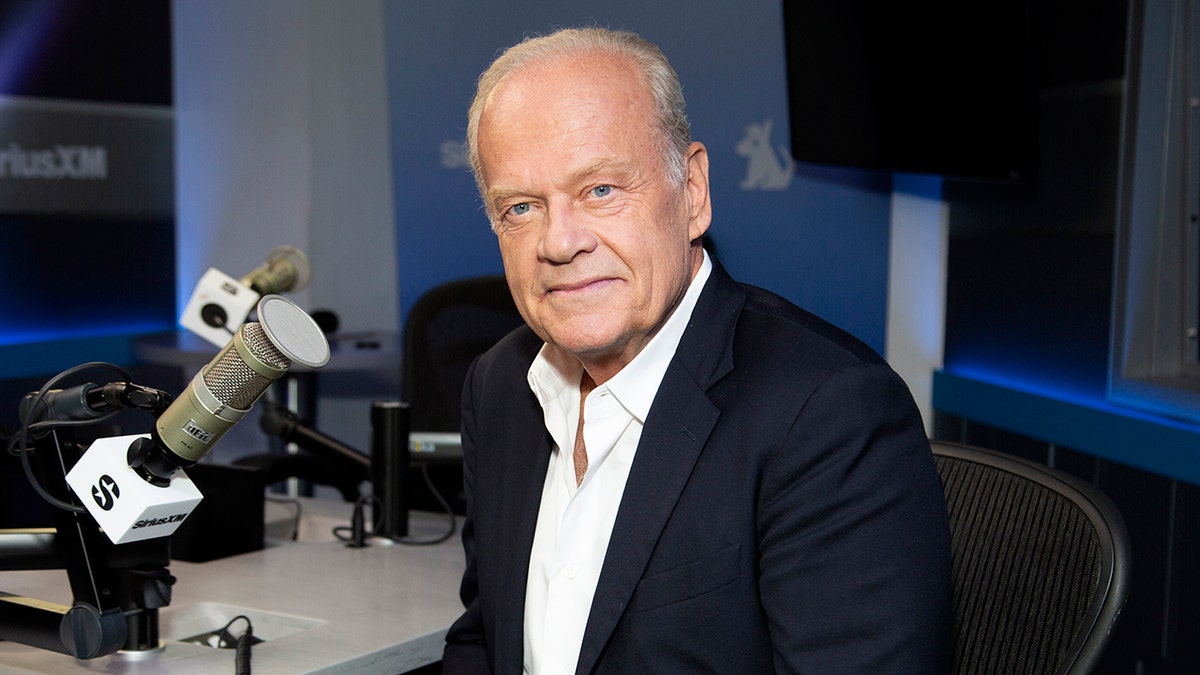 Kelsey Grammer sitting in a radio studio