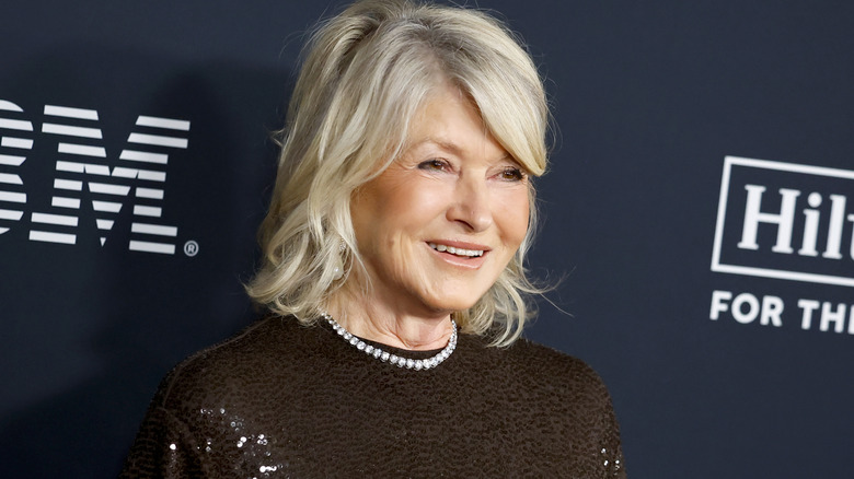 Martha Stewart smiling at a red carpet event.