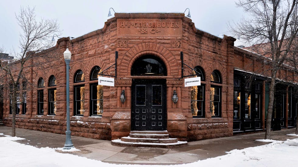 historic building with storefronts and snowcovered surroundings