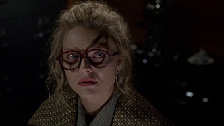 Selina Kyle wearing glasses in Batman Returns