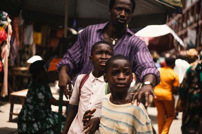 Ṣọpẹ́ Dìrísù, Chibuike Marvellous Egbo and Godwin Egbo in a scene from 