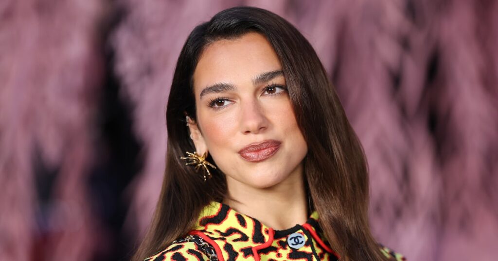 Dua Lipa Wore A Sheer Top & Slinky LBD On Her Latest Vacation