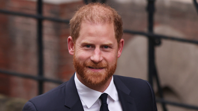 Prince Harry wearing a blue suit