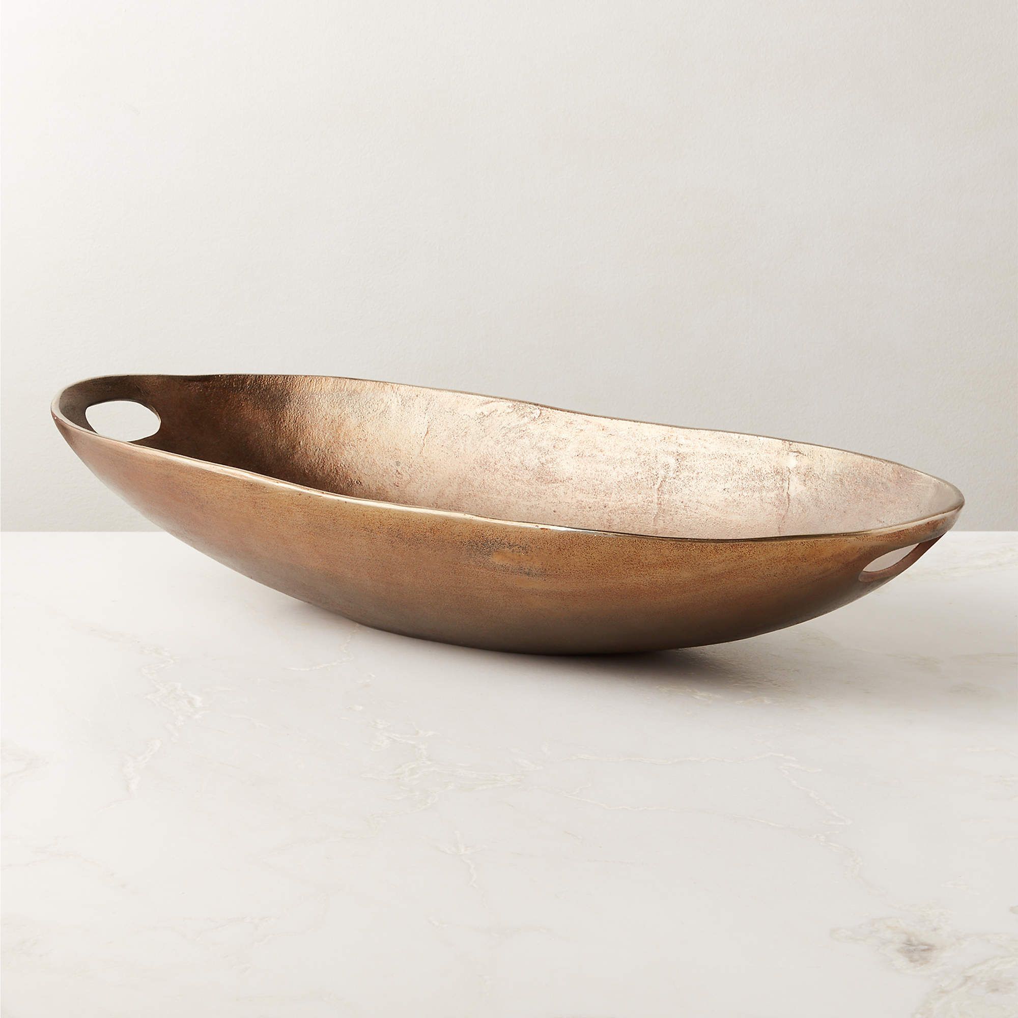Large curved metal serving dish