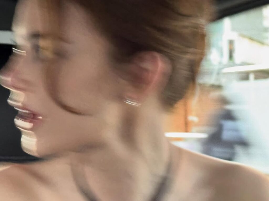 Emma Stone at BAFTAs photographed by Yorgos Lanthimos on IG