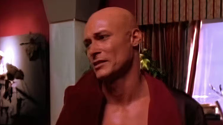 Scott James Wells as Lex Luthor, crying on Superboy