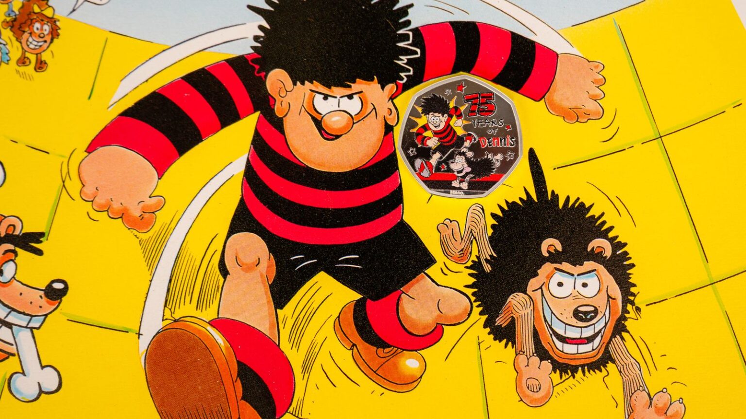 Dennis the Menace plays ‘greatest prank yet’ as Royal Mint presses 75-year anniversary 50p coins | UK News A commemorative 50p coin marking 75 years of the Beano comic Dennis the Menace. Pic: PA