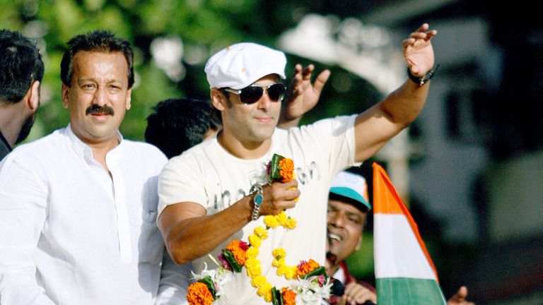 Salman Khan (R) waves to his fans during an election campaign rally for Baba Siddique (L) in 200.
Pic: Reuters