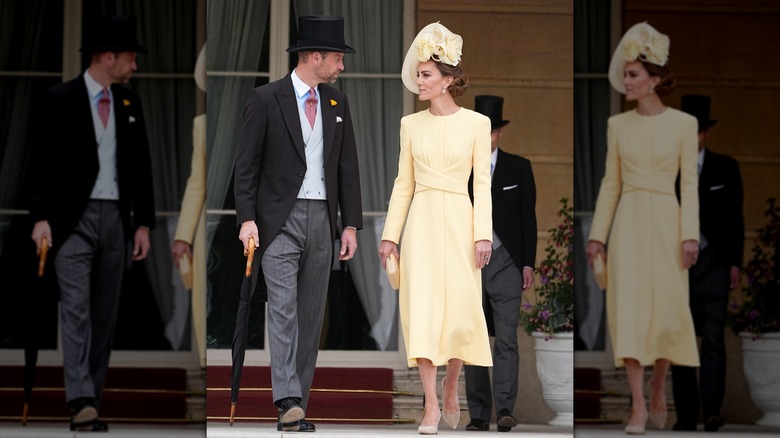 Prince William and Kate Middleton on the steps of Buckingham Palace