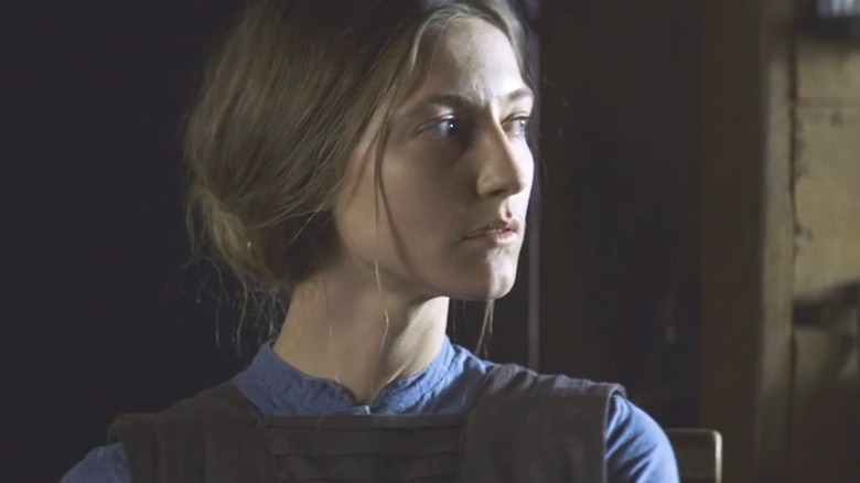 Lizzy staring to the side in 