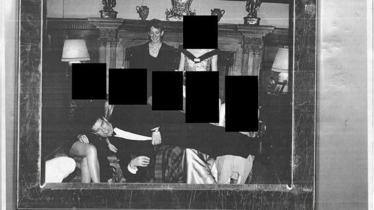 This redacted photo released by the U.S. Department of Justice shows Andrew Mountbatten-Windsor laying across several people's laps with Ghislaine Maxwell standing above