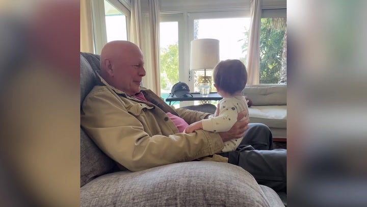 Willis shares a special moment with his granddaughter Louetta