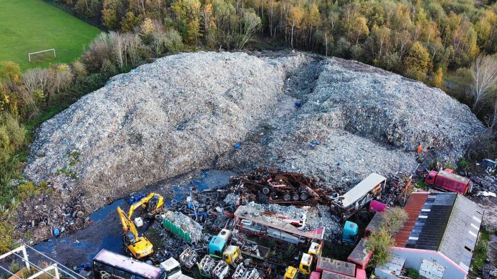 New activity at a huge illegal dump partly owned by King Charles - with diggers shifting waste - disputes over responsible party
