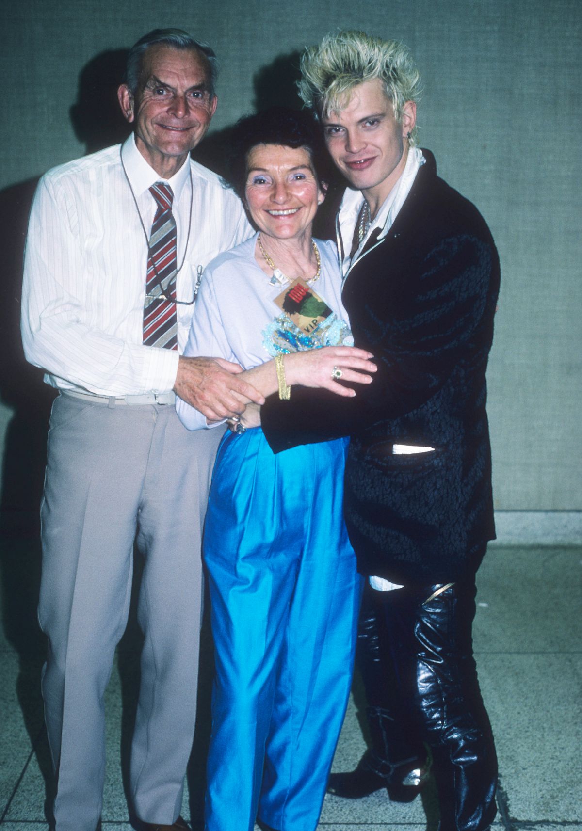 Rock singer Billy Idol and his father and mother pose for a portrait at the Minneapolis Auditorium in Minneapolis, Minnesota on April 28, 1987