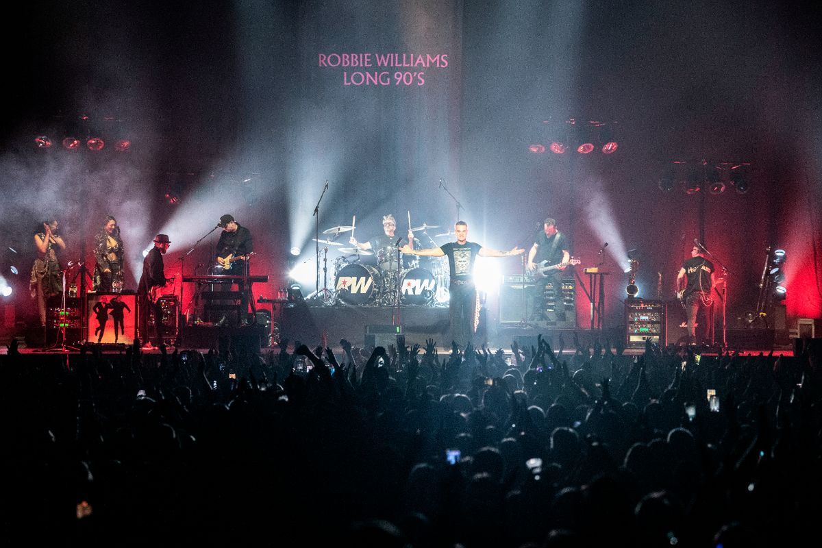 Robbie Williams performs at Aviva Studios in aid of War Child for BRITs week in Manchester on February 27, 2026