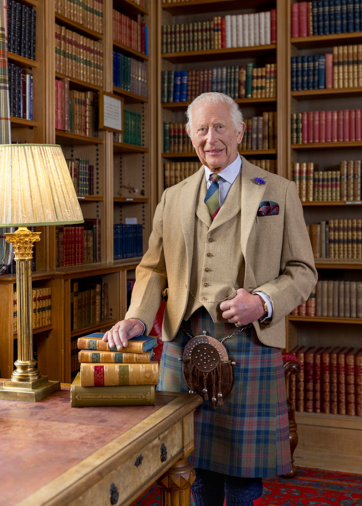 King Charles III in the Library at Balmoral, in a photo to mark Burns Night in 2025