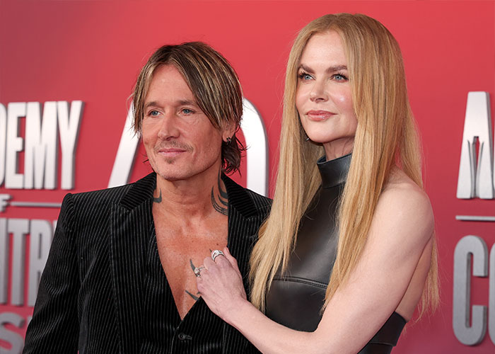 Nicole Kidman and Keith Urban posing together on red carpet, highlighting her comments on their divorce.