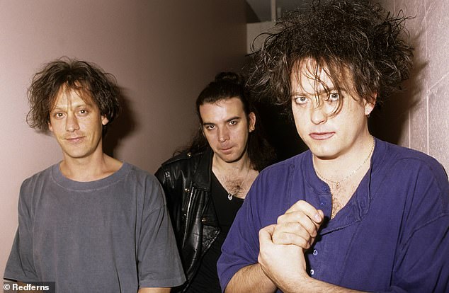 The band's official website confirmed the sad news that the musician passed away over Christmas 2025 following a short illness (Pictured L-R in 1992: Perry, Simon Gallup and Robert Smith)