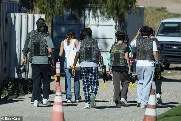 There appeared to be at least eight people in their paintball party