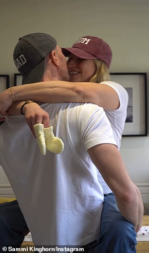 The video then showed Callum putting on a 'Dad' cap before Sammi appeared from behind him wearing her own 'Mum' hat