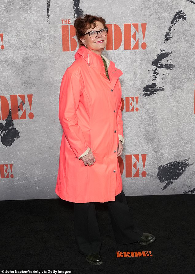 Oscar winner Susan Sarandon had the 40F-degree drizzly winter weather on her mind when she wore a coral-colored rain jacket on the black carpet