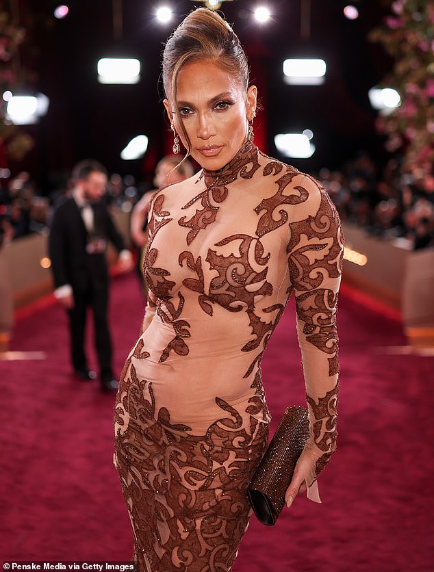 Jennifer Lopez, 56, revealed the celebrities that her kids had asked her to 'stalk' at a major award show just two months earlier; seen at 2026 Golden Globes in January