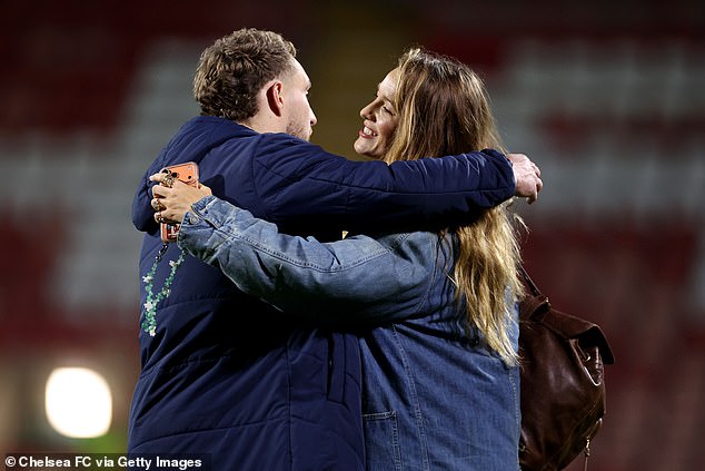 The Hollywood star carried a large teddy bear in her arms and hugged footballer Sam Smith