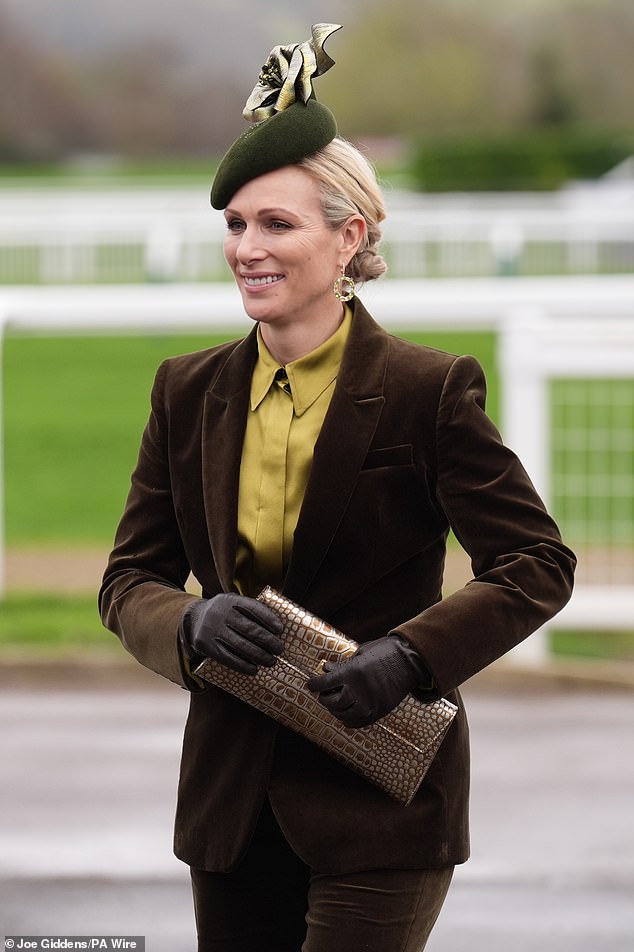 Zara looked chic in a brown velvet soon and crocodile print handbag