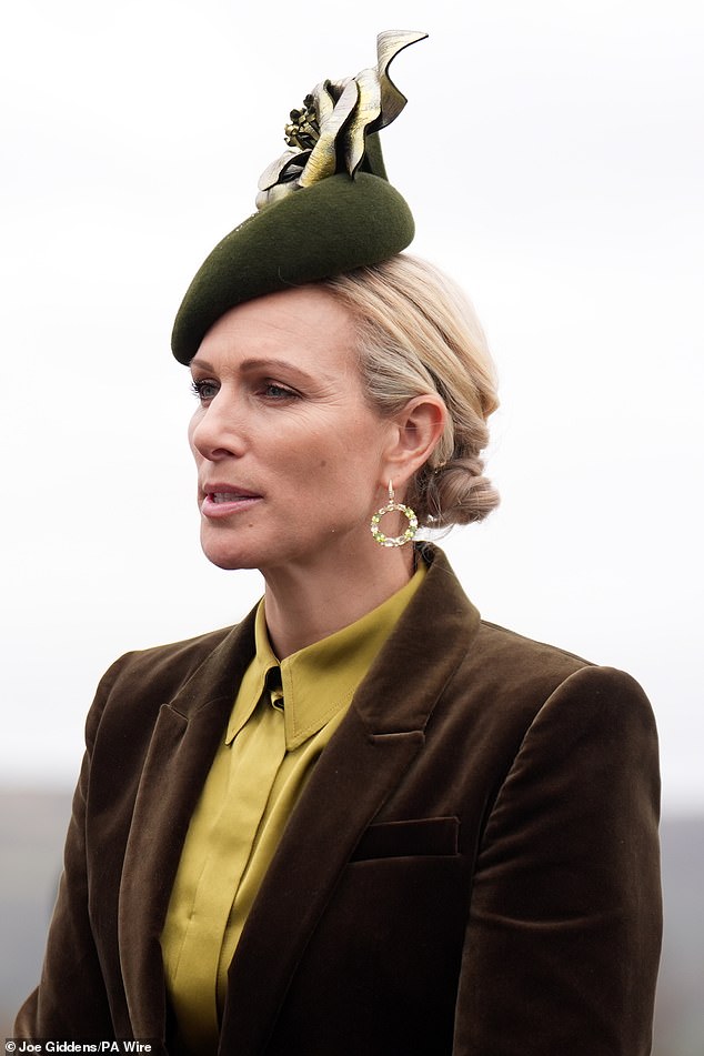 She wore glamorous jewellery alongside a stunning hat