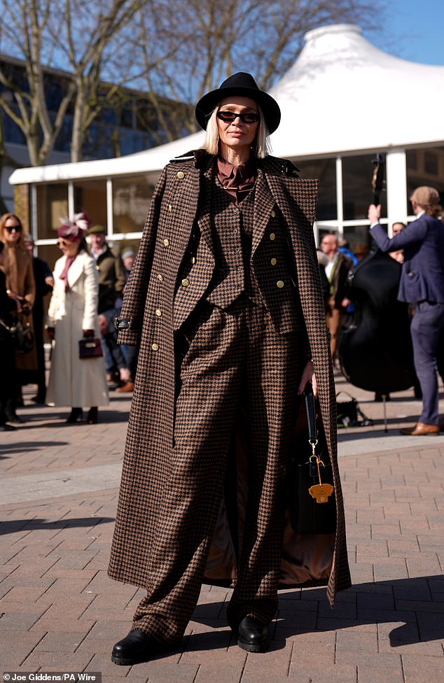 Jodie Kidd opted for a houndstooth suit with a matching coat and black shoes
