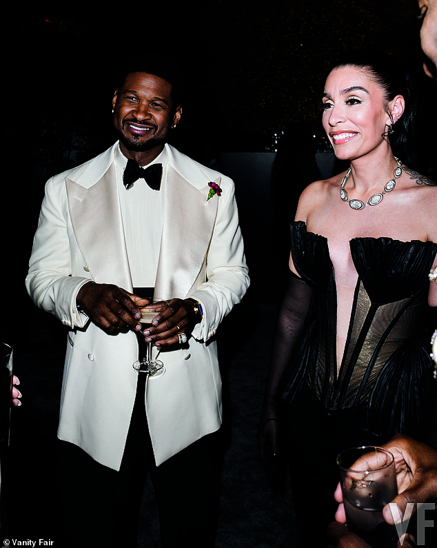 Usher and his wife Jennifer Raymond shared a laugh while speaking with others at the coveted event