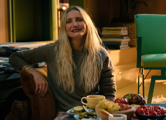 The star wore her hair down in beach waves as she added red lipstick