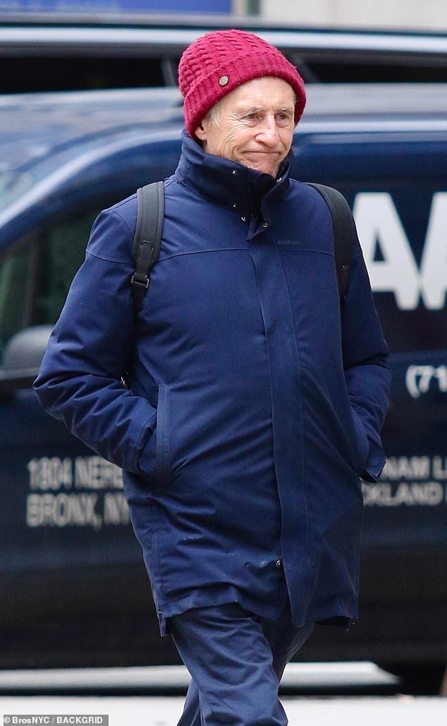 The 75-year-old actor enjoyed a solo outing in New York City on Thursday. He bundled up for the chilly day in the Big Apple in a large blue coat zipped up all of the way