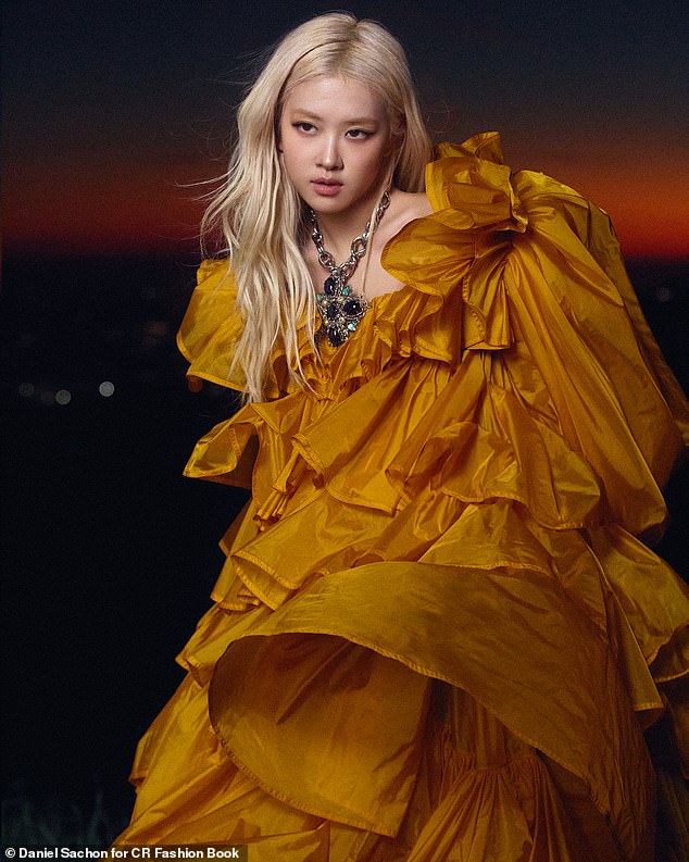 The singer, 29, opened up about how she hasn't fully mastered 'feeling completely comfortable in her own skin' yet despite being a member of the K-Pop group and a successful solo artist