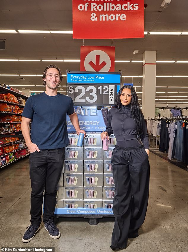 She posed with Daniel Solomon, who founded Update in 2019, in one snapshot