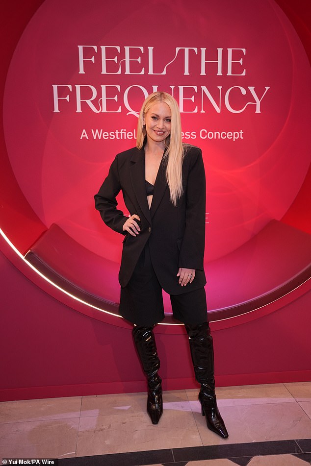 Meanwhile, Kimberly, 44, put on a sizzling display in an oversized black blazer paired with a skimpy black bra and over-the-knee leather boots