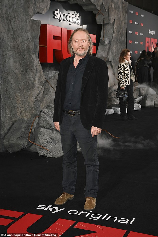 David Mackenzie beamed on the red carpet