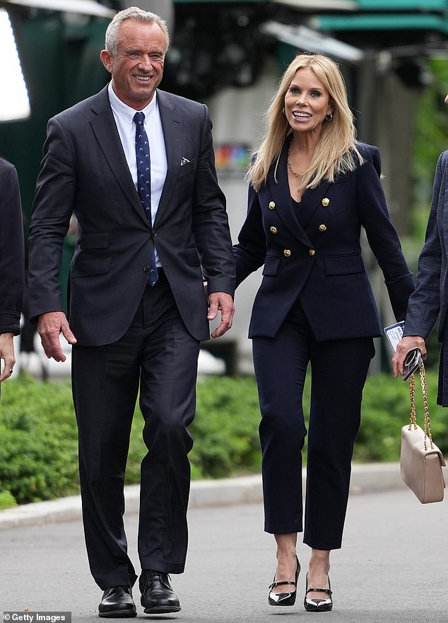 The Bad Moms star also claimed that Handler's allegations years later were for 'attention' and to possibly 'make fun of' her husband RFK Jr.; seen in 2025 in Washington D.C.