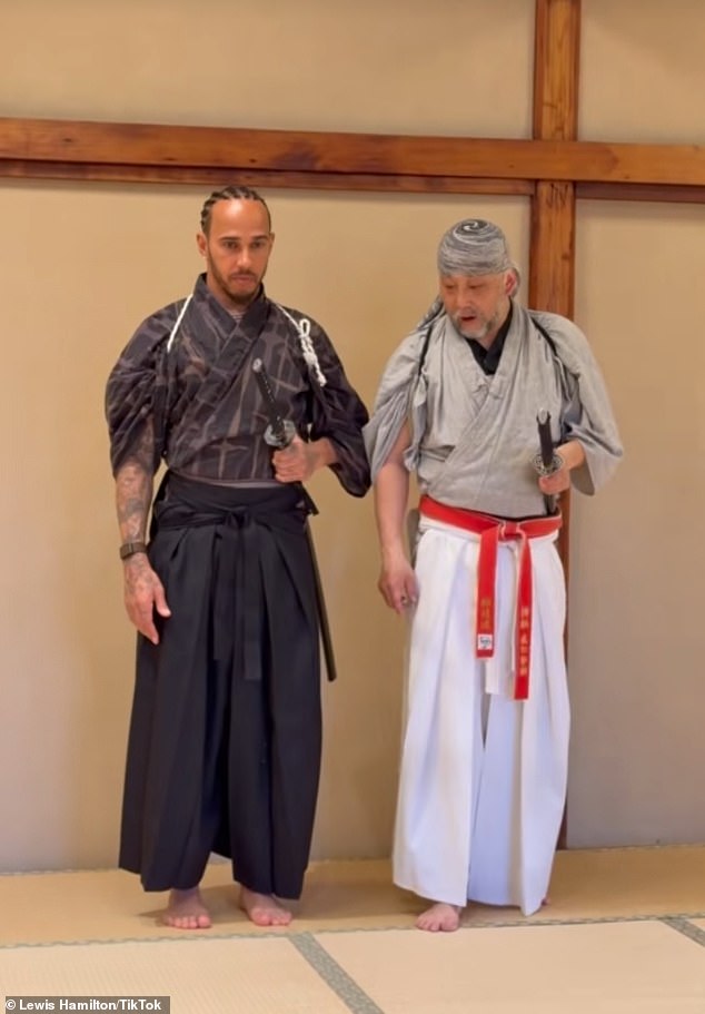 The All's Fair producer-star is in Japan to support her boyfriend Lewis Hamilton (L) - who's racing in the 2026 Japanese GP which runs Friday-Sunday in Suzuka - and he got a private lesson from samurai artist Tetsuro Shimaguchi (R)