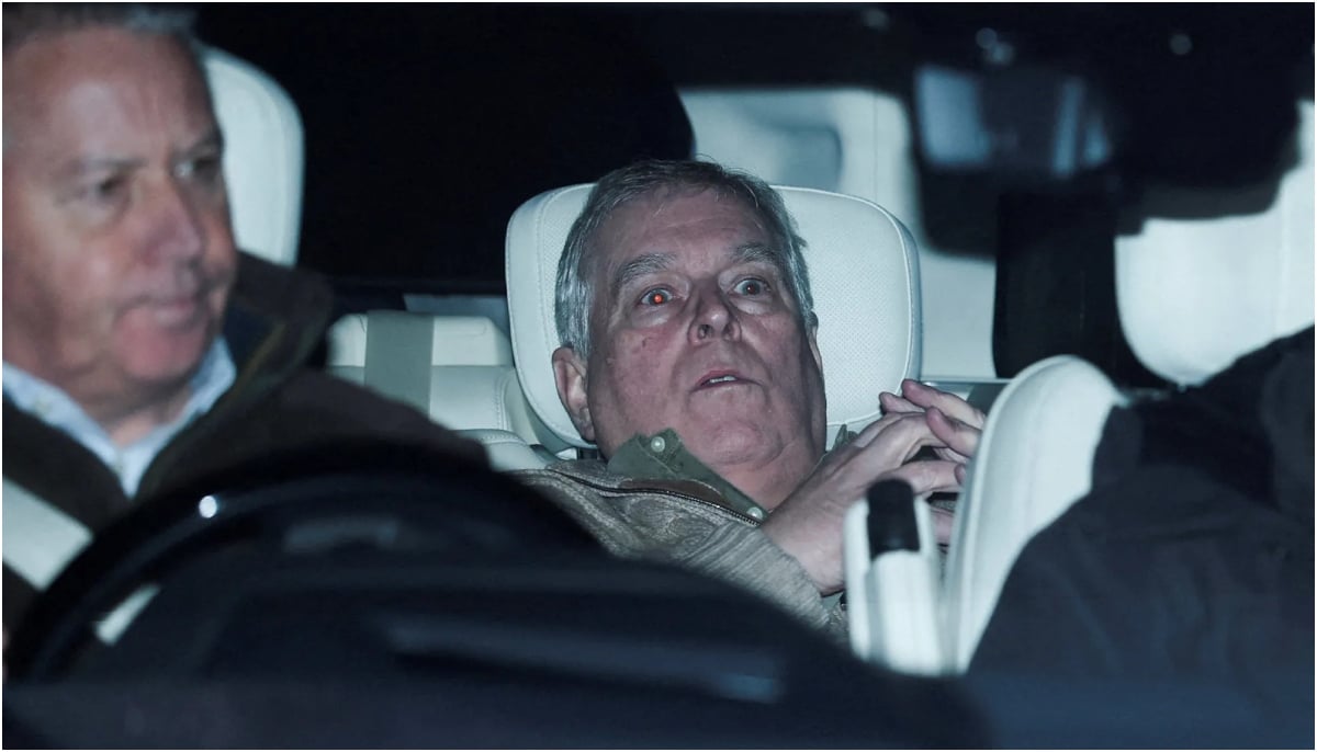 Andrew during arrest/ Reuters/Phil Noble