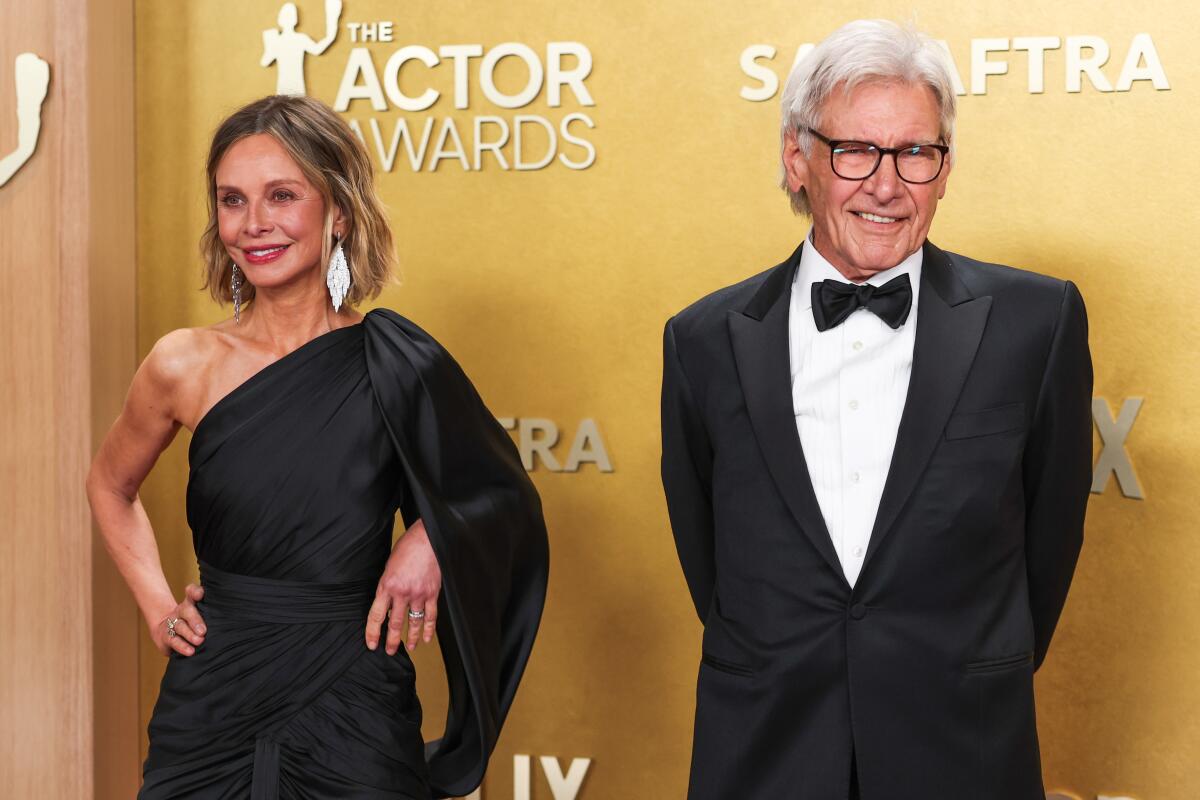 Calista Flockhart and Harrison Ford at the 32nd Actor Awards.